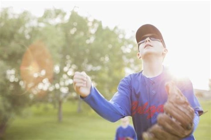 Can you play baseball with glasses?