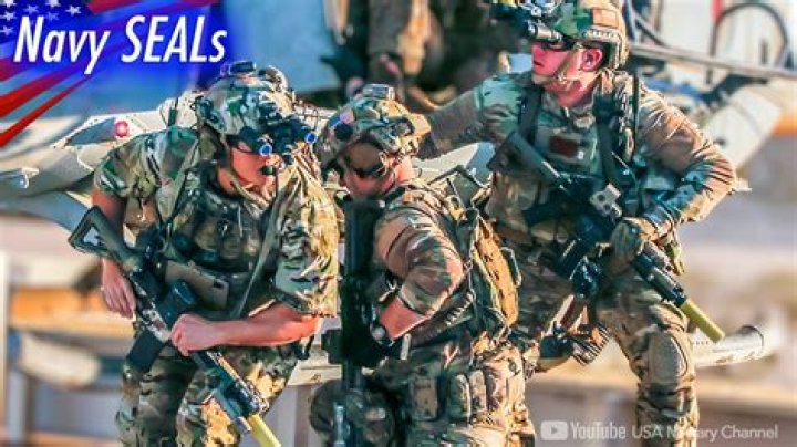 How far does a Navy SEAL have to swim underwater?